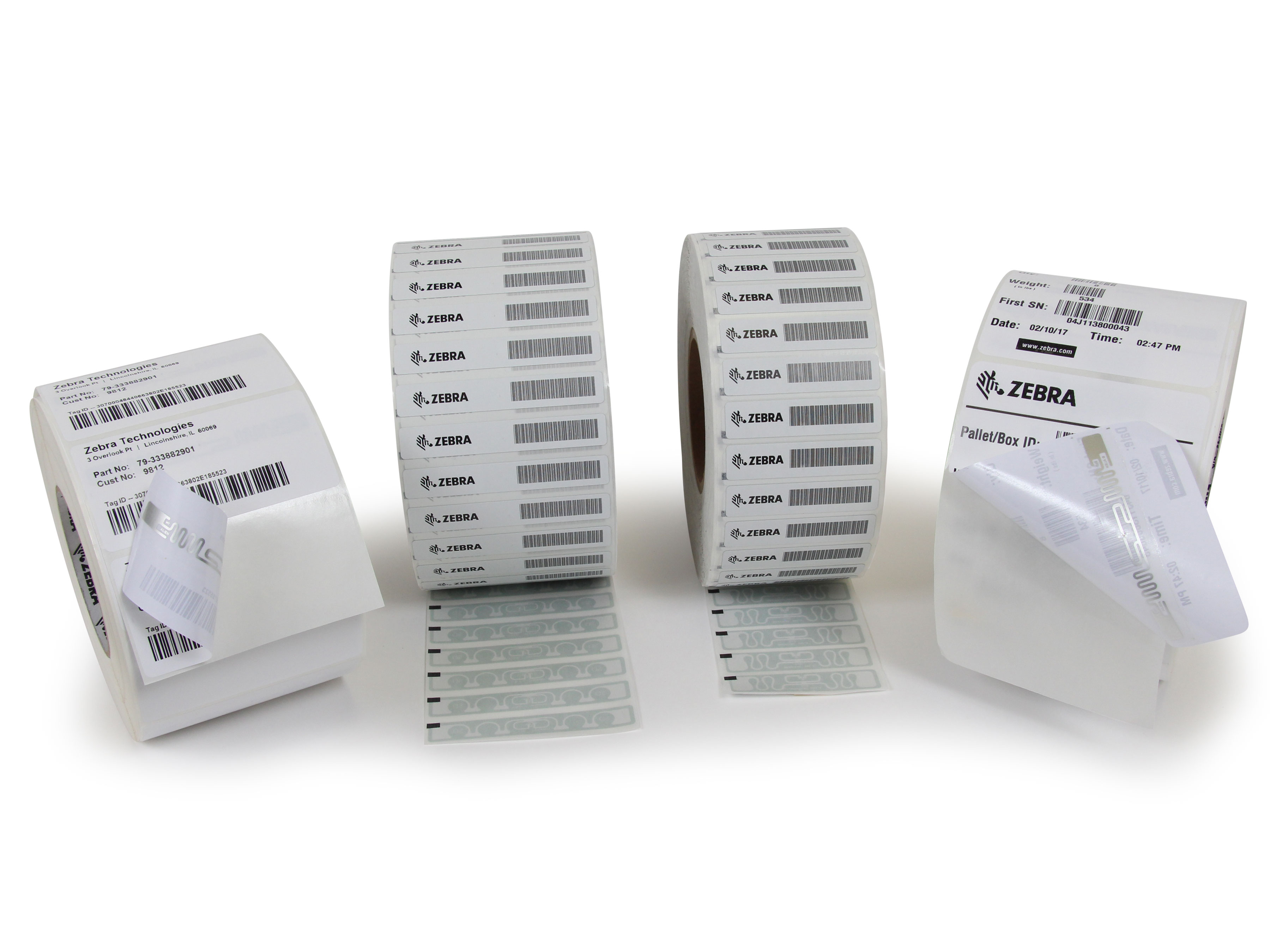 Zebra RFID label rolls with the embedded antenna visible beneath a peeled label